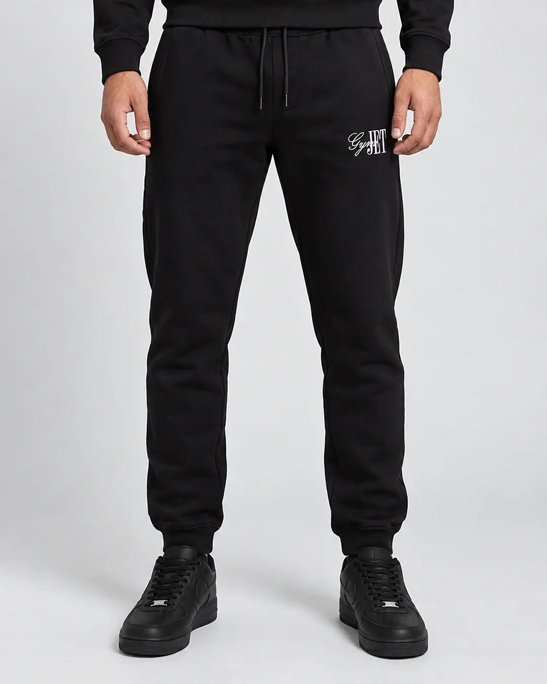 GYMJET Signature Fleece Sweatpants - Black, front, with the embroidered GymJet signature logo