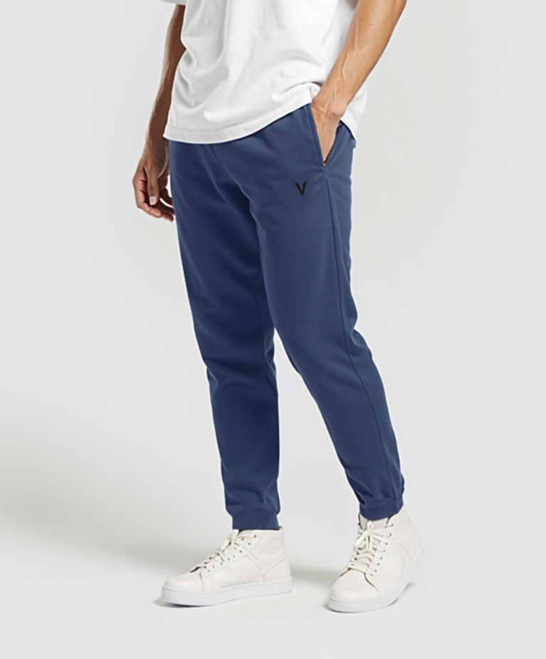 Man wearing a white t-shirt and blue pants on a white background