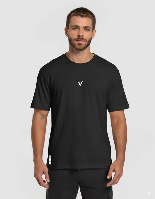 Man wearing a black t-shirt with a logo on a white background